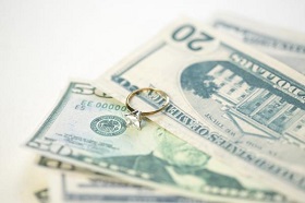 Money and engagement ring